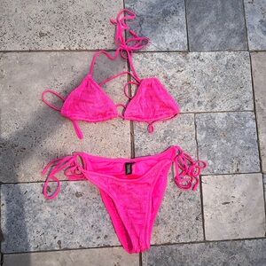 A hot pink Triangl bikini, adjustable straps, in great condition